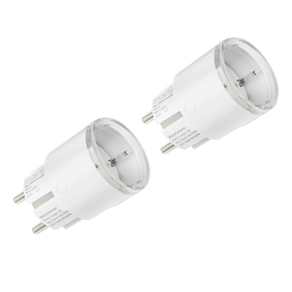Two Shelly Plug S Gen MTR White smart plugs with European-style prongs are shown on a plain white background. Each plug features a clear outer ring and labeled text on the side.